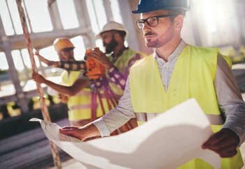 Picture of construction engineer working on building site