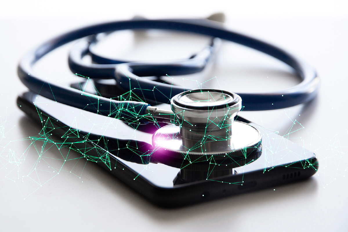 Stethoscope resting on a smartphone with glowing digital network lines, symbolizing digital health and telemedicine.